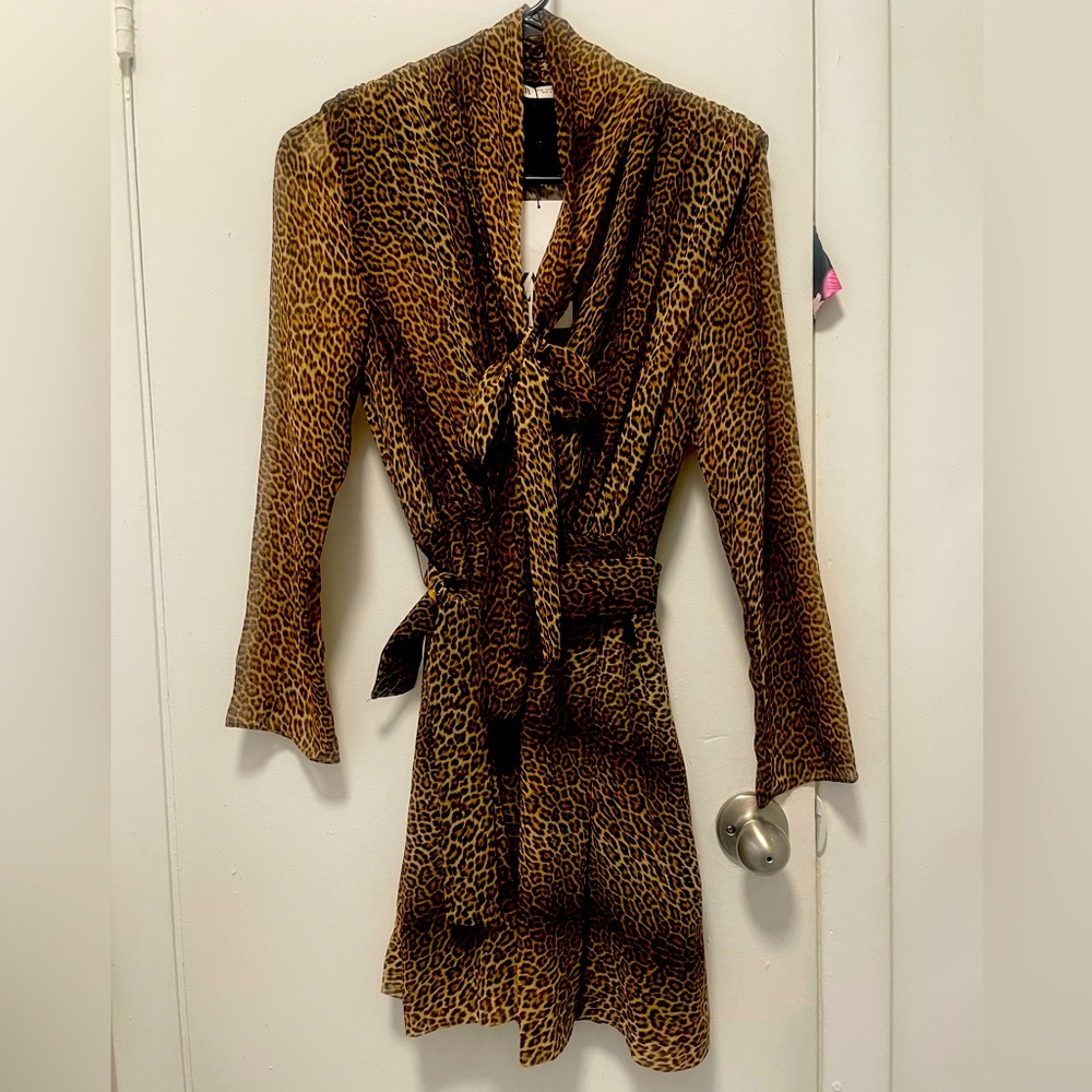 Zara size XS leopard romper. Tie at neck, long sleeve. Front snap.